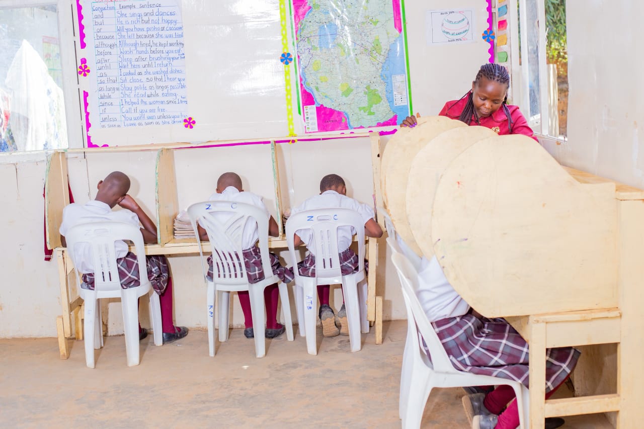 A.C.E. learning centre with students at their PACE workbooks